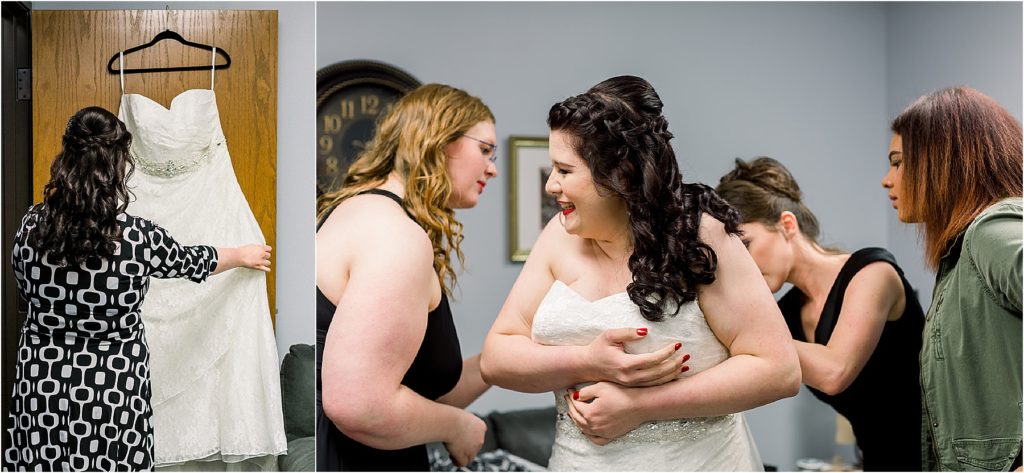 Bride viewing her dress, and bridesmaids helping her get into her dress