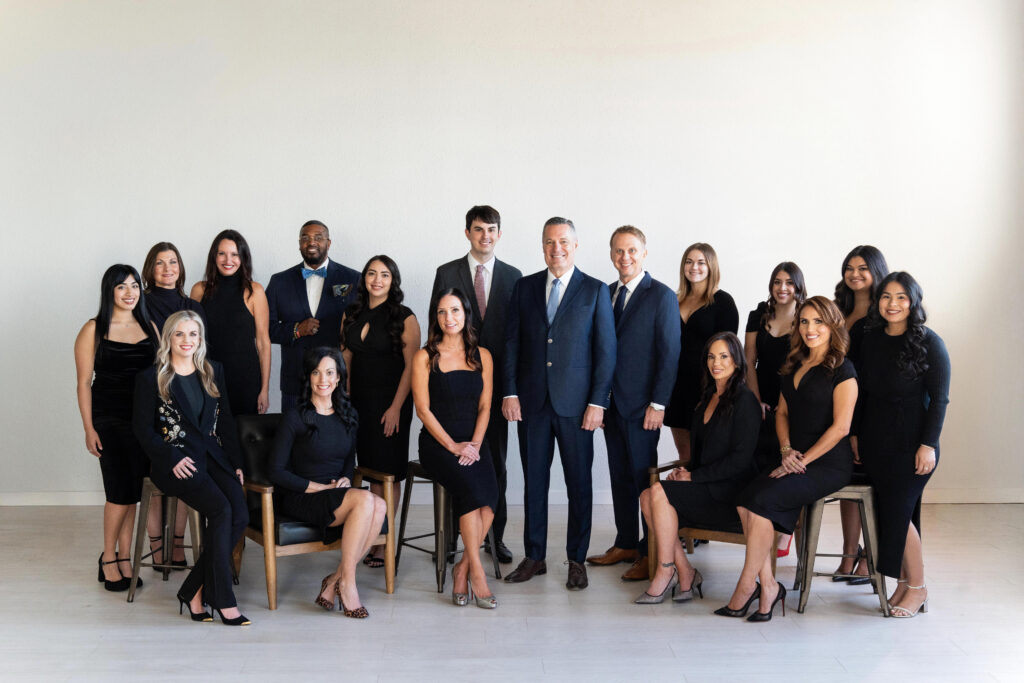 Group image of the McIntyre Law team including all Attorneys, Paralegals, Office Manager and Assistants.